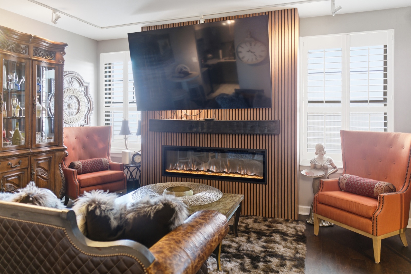 Electric fireplace in slatted accent wall, up close