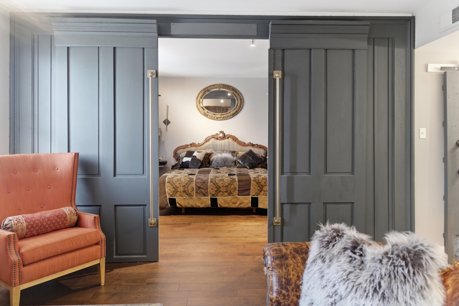 Bedroom seen through paneled sliding doors