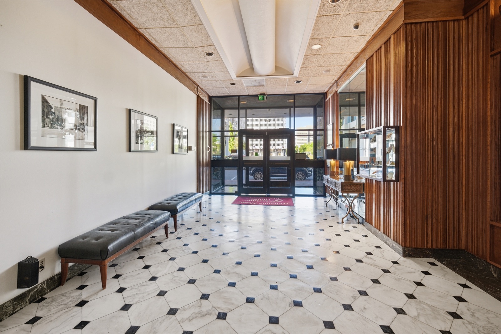 Lobby with marble floor and walnut paneling